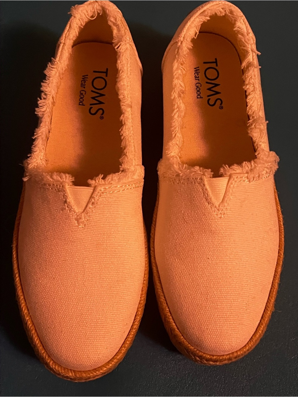 TOMS Frayed Canvas Slip-Ons in Orange